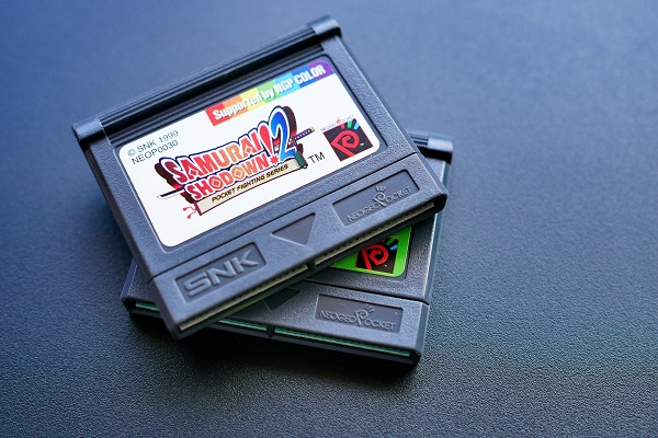 Two video games stacked on top of each other